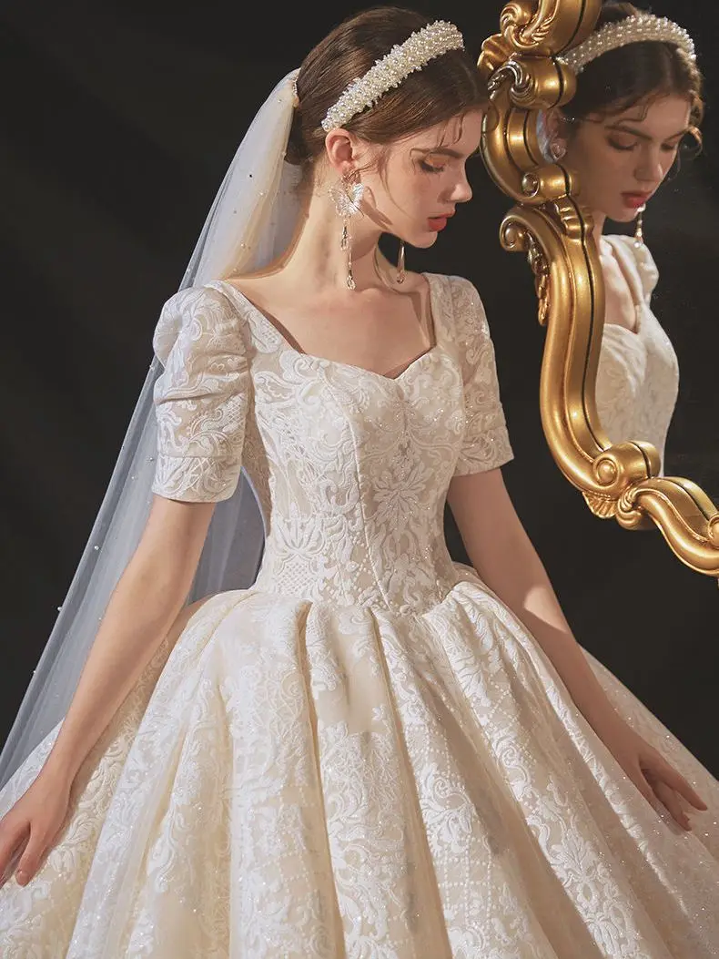 Galvenais kāzu kleitu 2023 jaunu velciet izplūdes kvalitātes tiesa līgava high-end retro faktūru franču vienkārša kvadrātveida apkakle